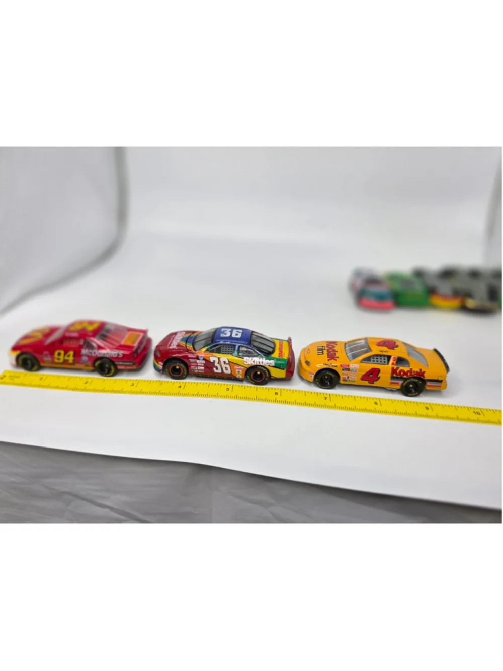 Racing Champions lot of 8 1:64 scale die-cast cars